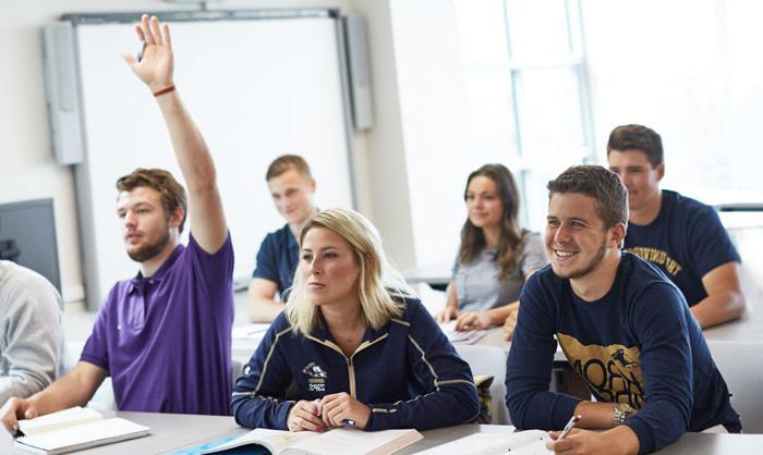 Students socializing in a exloratory community room at The University of Akron